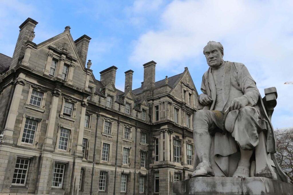 Statue and historic buildings inside Trinity College Dublin along the 5k running route